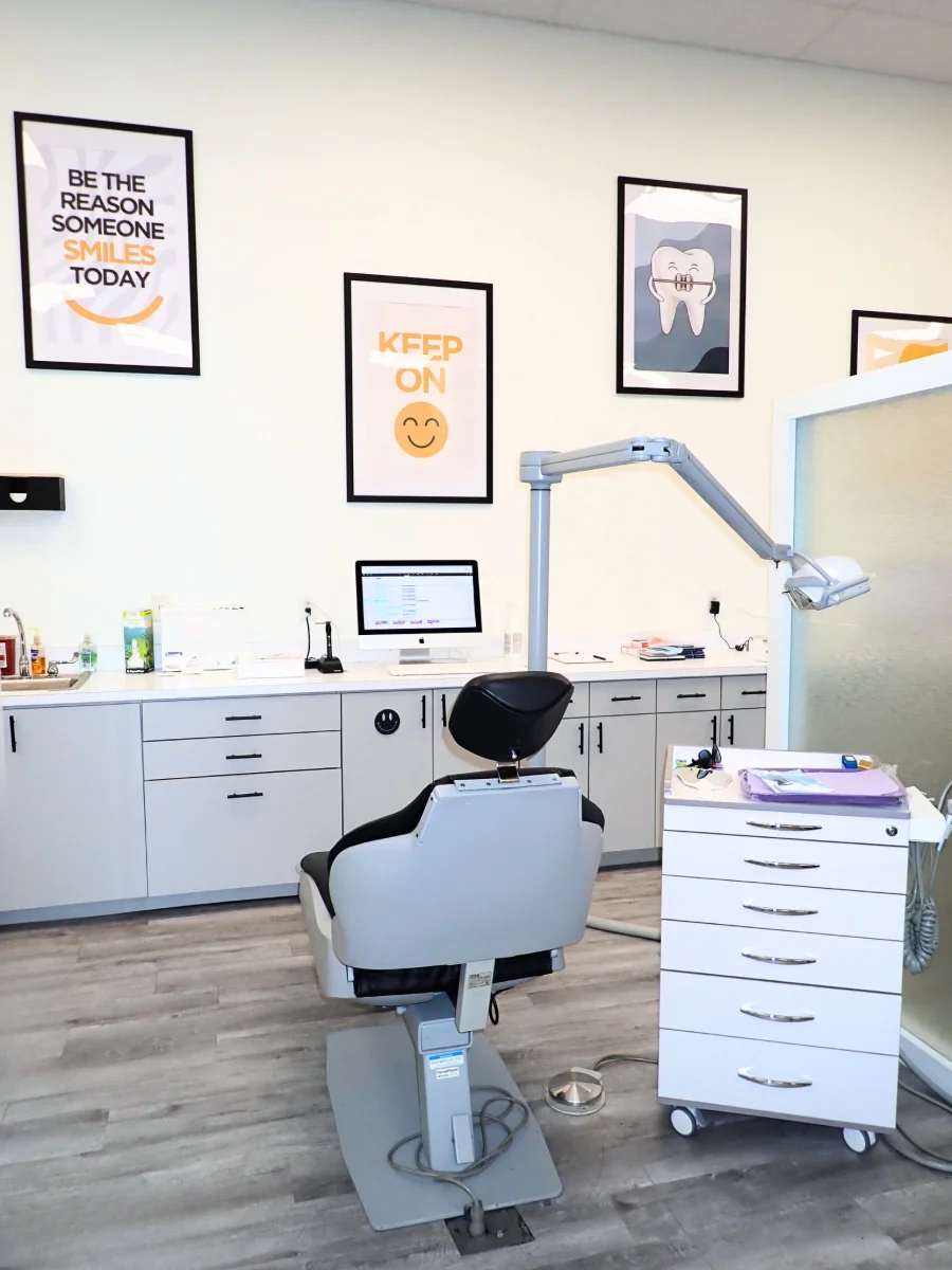 Private exam chair with motivational artwork in the Miami Lakes office