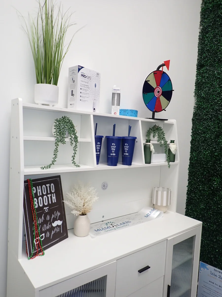 Patient rewards corner with a prize wheel and photo booth in Miami Lakes