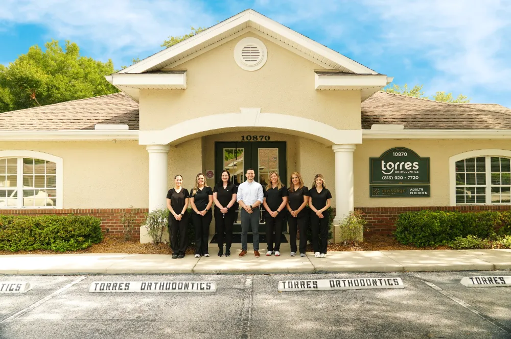 Smiling family being welcomed at Torres Orthodontics